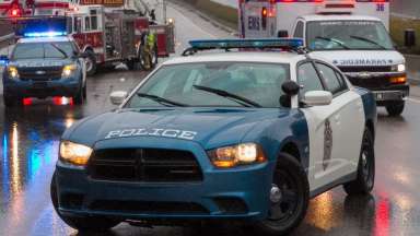 Raleigh Police Vehicle in roadway blocking traffic for an accident