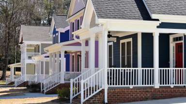 row of single story homes in east college park with porches