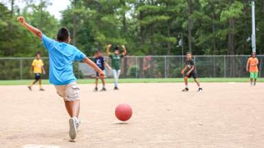 Kids playing kickball