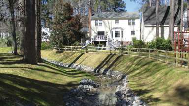 A repaired stream in a backyard.