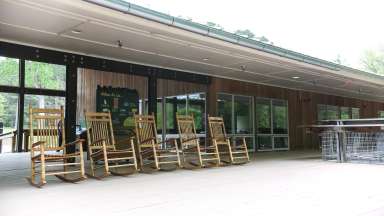 The outside deck with rocking chairs