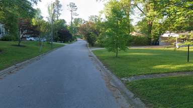 Looking down Brighton Road towards the north, shows no sidewalk on the street