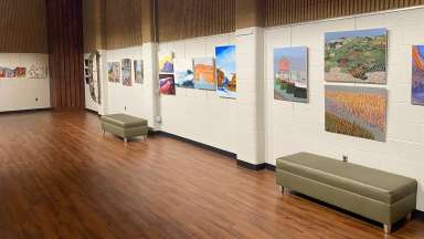 artworks by the students of Peter Marin hanging on Wall