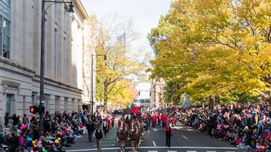 Crowd gathers along Christmas Parade route in Downtown Raleigh