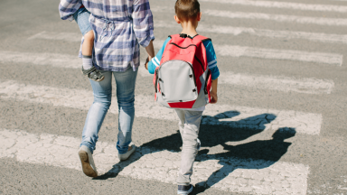 mom with kids at crosswalk