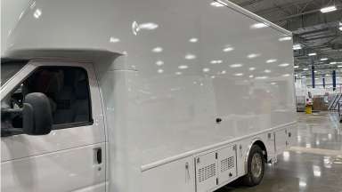 Photo of a large white van with blank sides