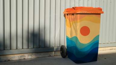 Painted garbage bin