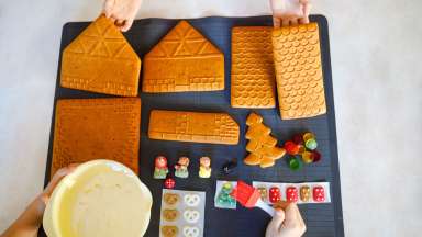 gingerbread cookie houses awaiting decorations