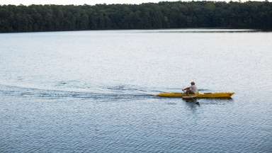 a person doing crew on a lake