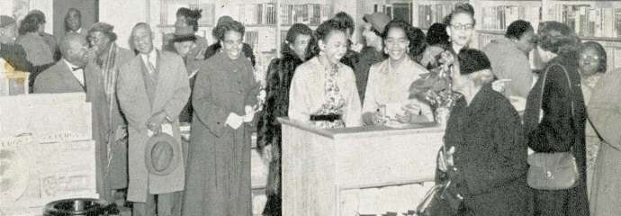 old photo image of people in a store