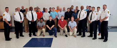 RFD Lateral Transfer Firefighters standing with Command Staff