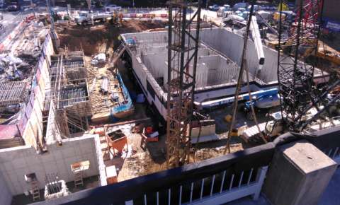 Image show lots of construction activity at City Hall building site