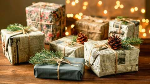 A table with various wrapping gifts sitting on it