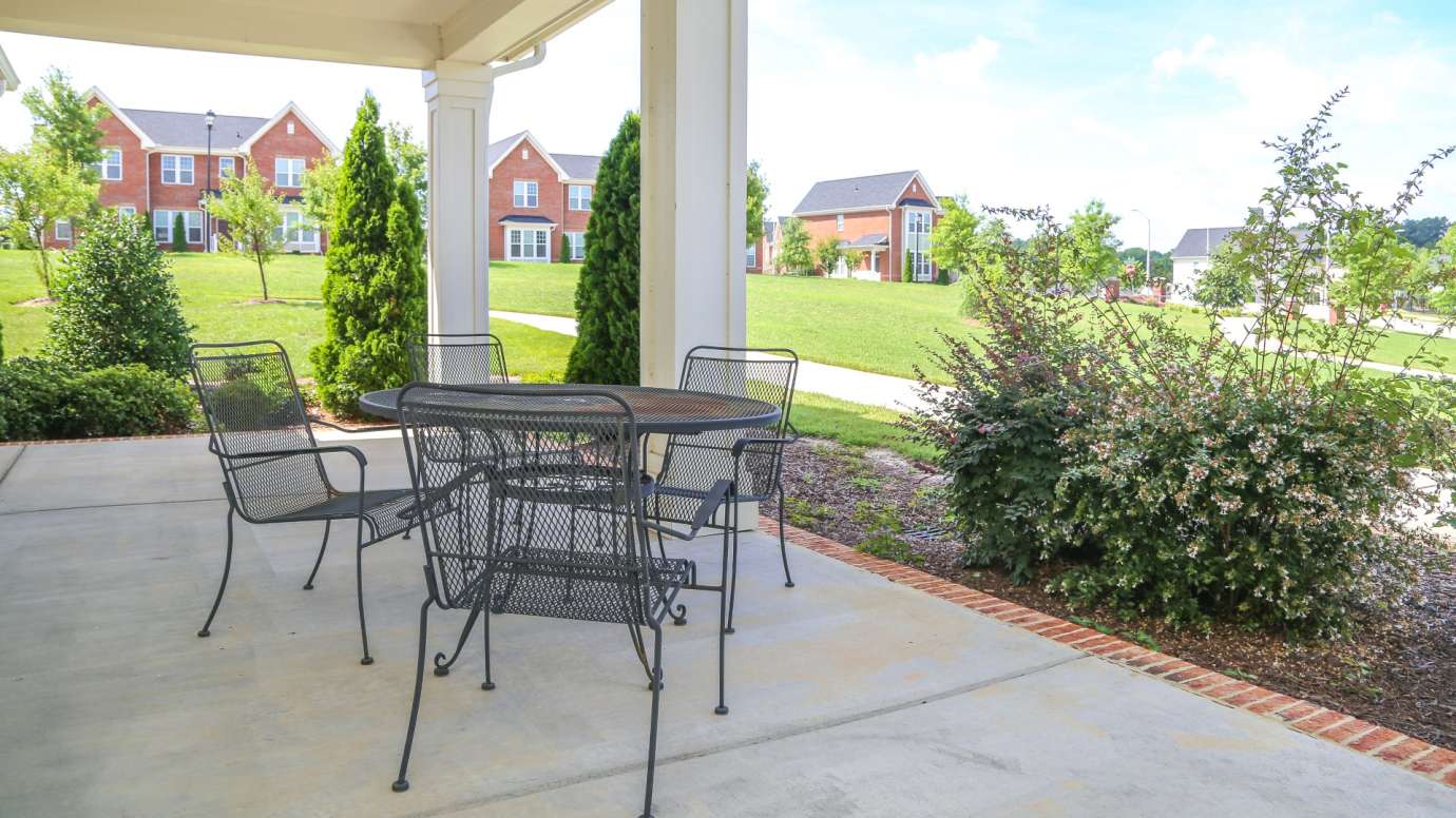 The patio area with chairs and tables 