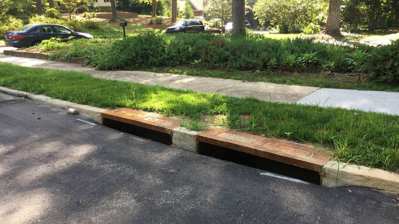 New storm drains on Audubon Drive that collecting water from the road when it rains. 