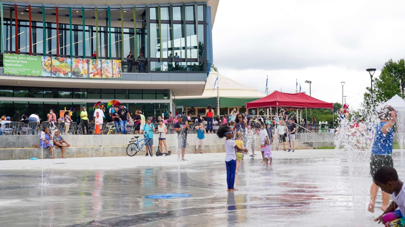 Little girl plays at splash pad Chavis Par