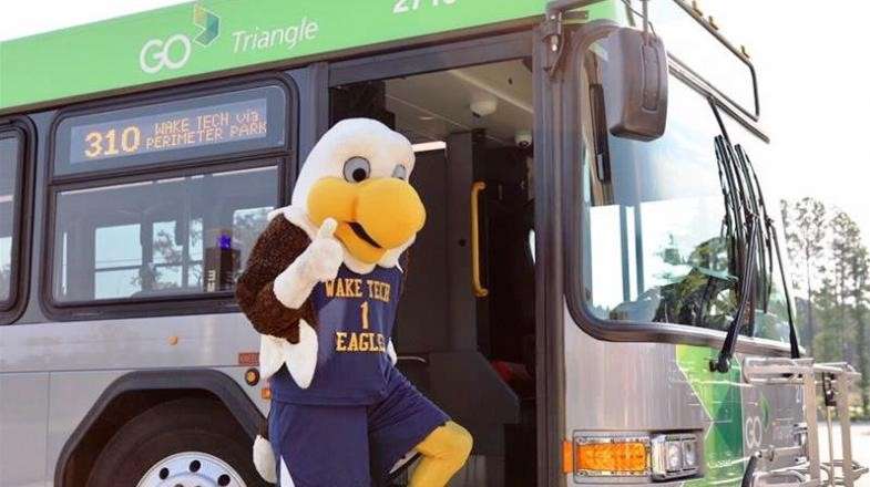 Wake Tech Mascot boarding GoTriangle Bus