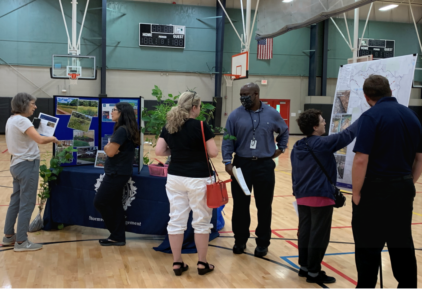 Stormwater staff speaking with residents Hare Snipe