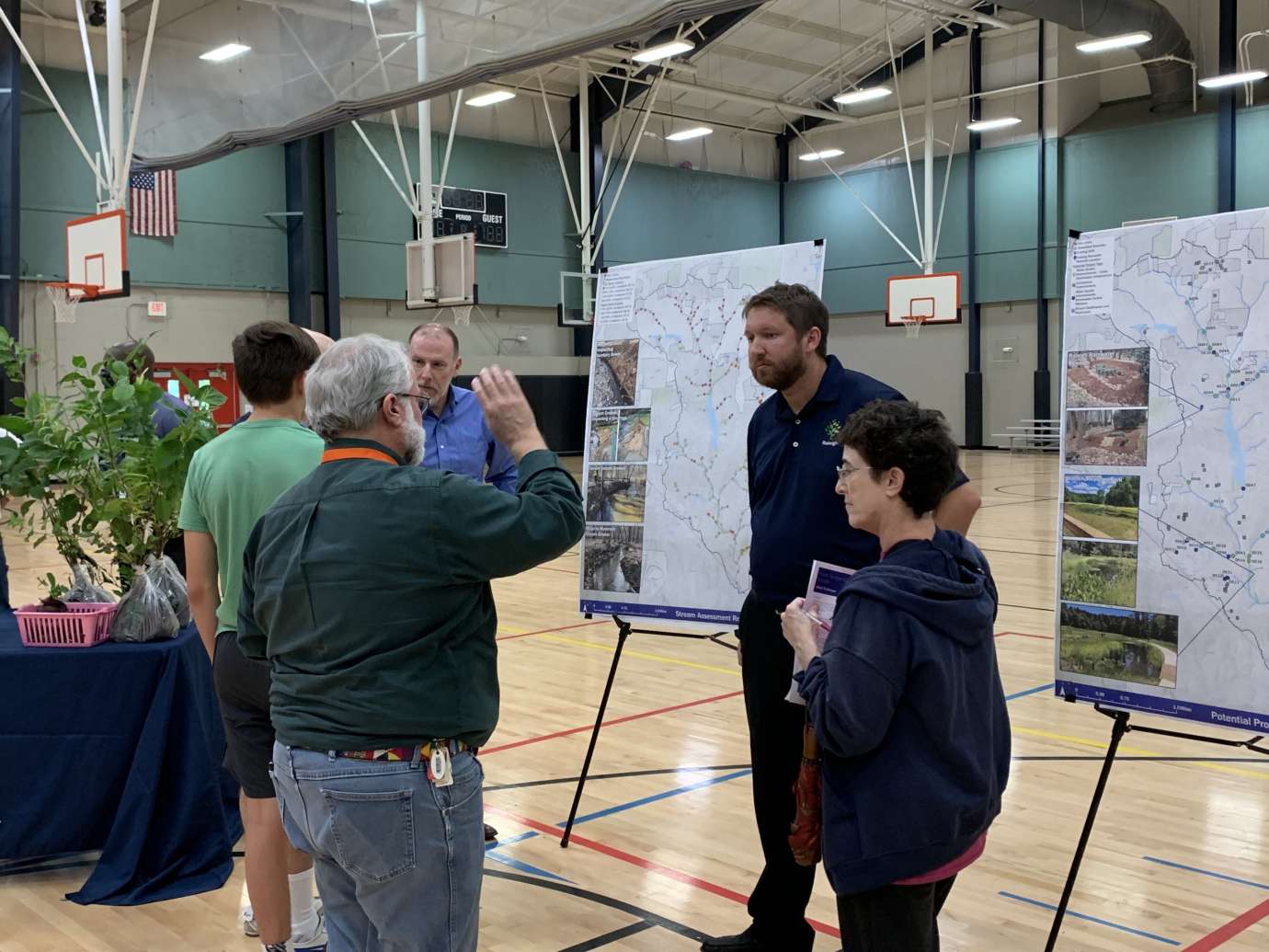 Stormwater staff speaking with residents Hare Snipe