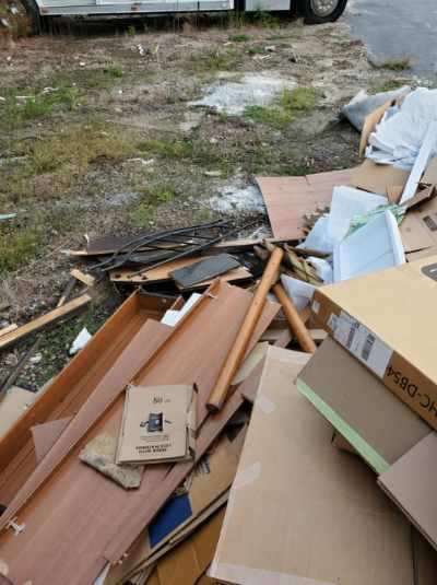 Pile of wood illegally disposed of at Restore