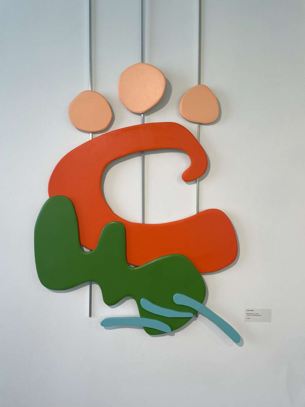 Colorful wall hanging with organic shapes