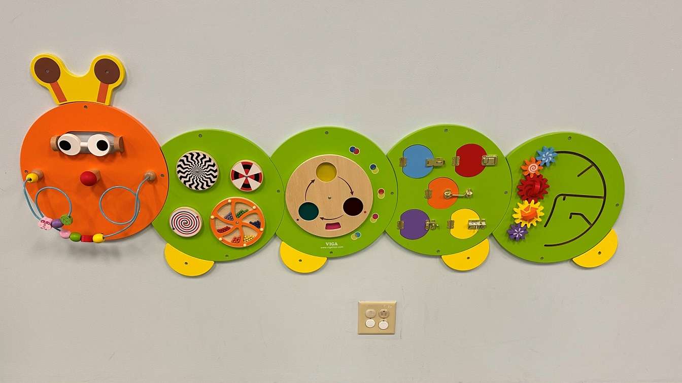 caterpillar activity wall at Greystone