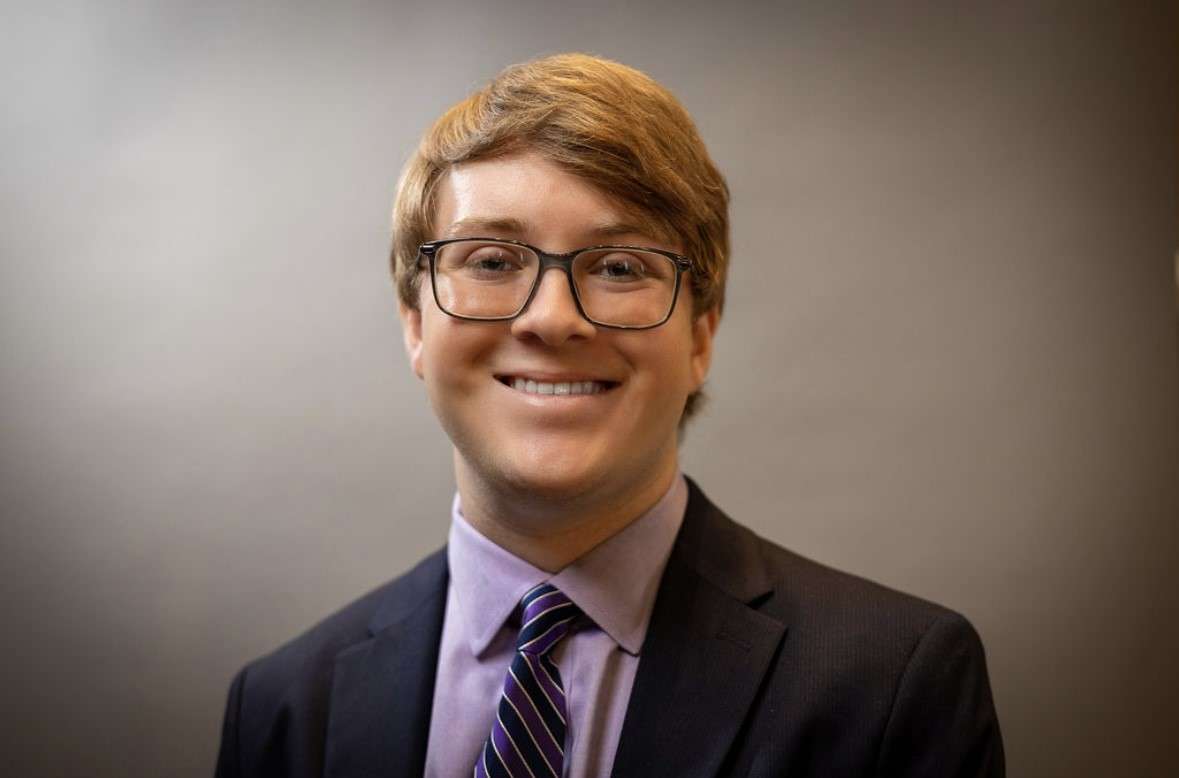 Young White male poses for portrait