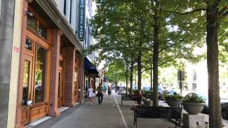 People walking down Fayetteville Street