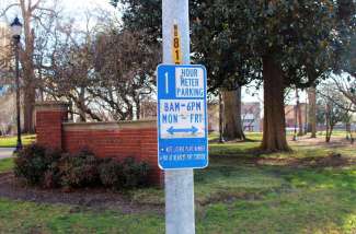 Metered parking sign