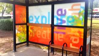 Bus shelter wrapped in artwork with Sir Walter Raleigh