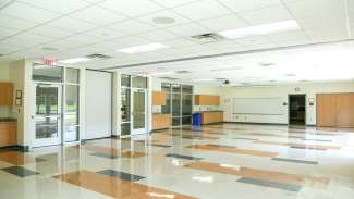 A large meeting room at Halifax Park with projectors and whiteboards 