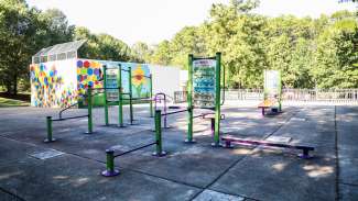 Adult outdoor fitness station with different activities at Peach Road Park