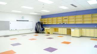 Large countertop workspace with two hand washing sinks and open space