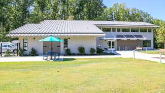 An exterior shot of the outside front part of the Forest Ridge community center 