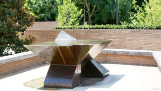 A 12-ton granite water monument that honors the area's notable pioneers in the civil rights movement.