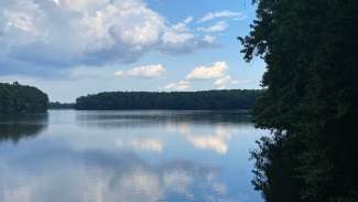 Clouds reflecting off the water at Lake Johnson