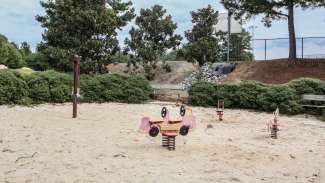 A smaller playground area designated for younger kids 