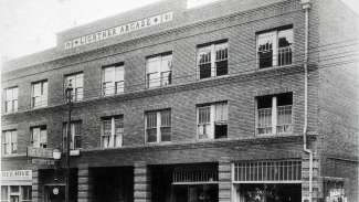 Black and white photo of "Black Main Street" including M&F Bank 