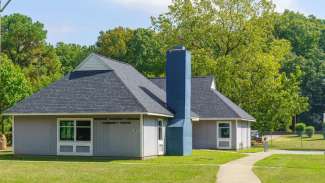 Front view of Southgate Park Community Center with trees in background