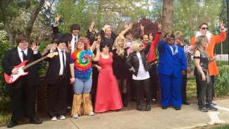 A group shot of participants of Special Theatre Arts of Raleigh, a 2022 Raleigh Medal of Arts awardee