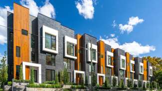 Streetscape of The Saint townhomes on St. Mary's Street in Raleigh.