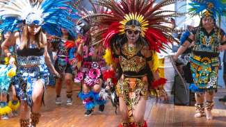 Dia de los Muertos dancers in traditional attire