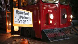 haunted red trolley stop sign