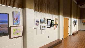 Artwork made by Student, Instructor, & Patrons at Sertoma Arts Center hang on the wall