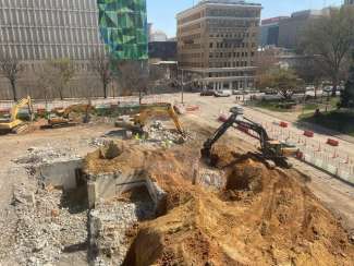 Civic Tower job site showing the basement and crews working to dig it out. 