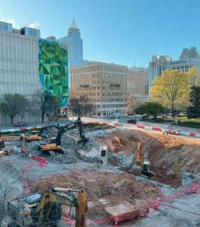 image shows a portion of the downtown skyline and the construction site of the new Civic Tower. 