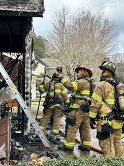 Firefighter uses the new thermal-imaging camera to find “hot spots” to extinguish all fire in the structure. 