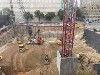 Image shows civic tower construction site, including the base of the new tower crane. 