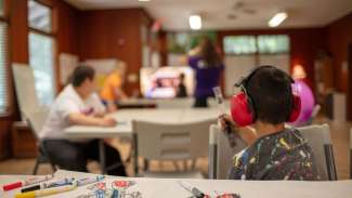 kids in classroom with headphones